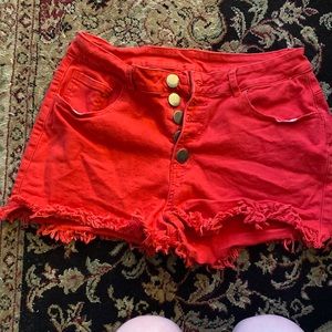 Red button-up shorts